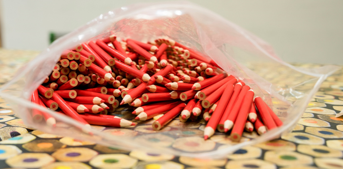 a pile of little red pencils